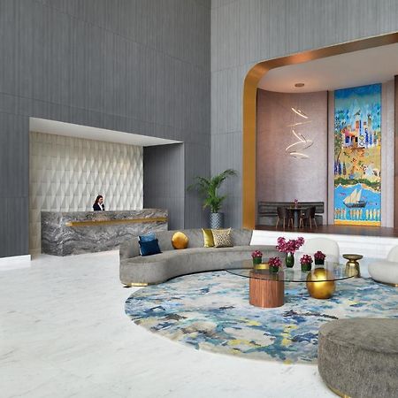 Movenpick Jumeirah Village Triangle Дубай Экстерьер фото The lobby of the hotel