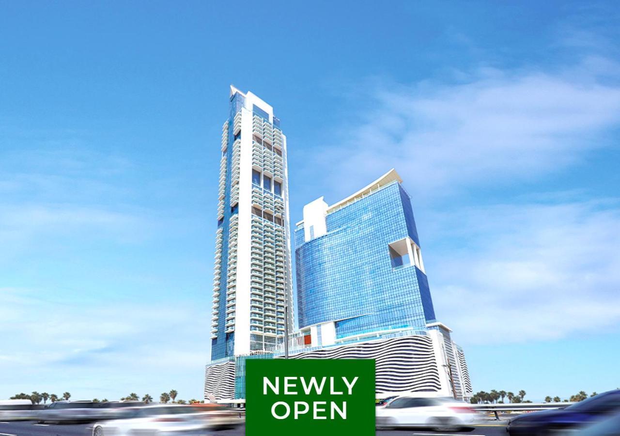 Movenpick Jumeirah Village Triangle Дубай Экстерьер фото The 101 Tower